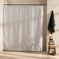Wavy beige zebra markings repeating across an off-white curtain ground