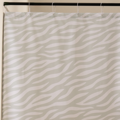 Close detail of the beige animal stripes on the woven fabric