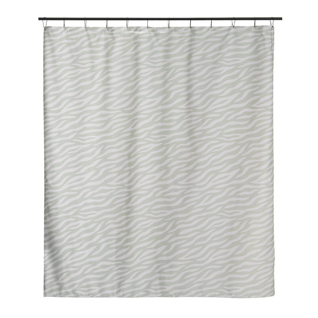 Animal print curtain styled in a warm neutral bathroom setting