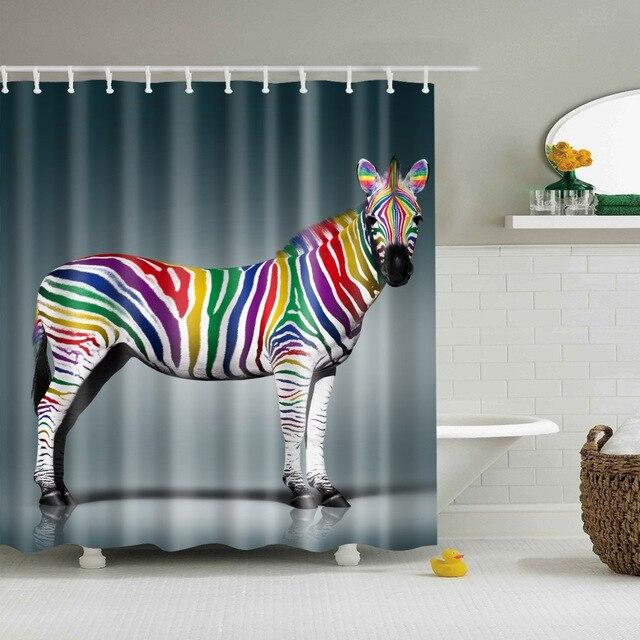 Full length zebra in profile with rainbow coloured stripes on a grey blue gradient