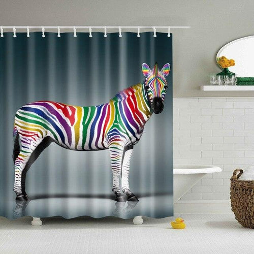 Full length zebra in profile with rainbow coloured stripes on a grey blue gradient