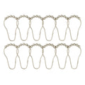 Twelve satin silver curtain rings crowned with small metal balls
