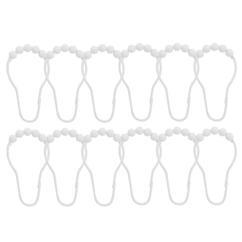 Twelve white curtain rings each topped with a string of round beads