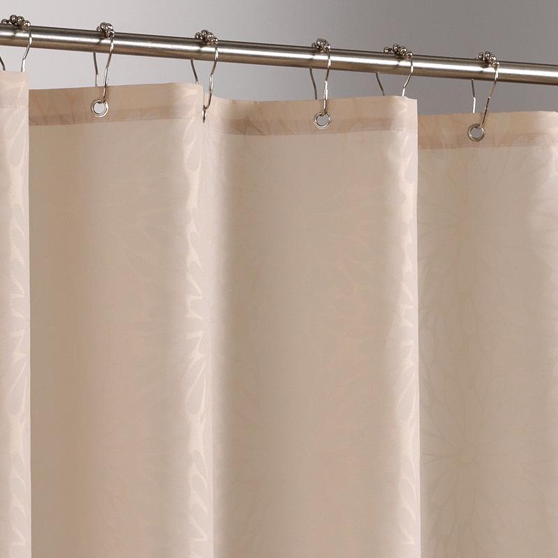 Heavy cream fabric hanging in regular even folds