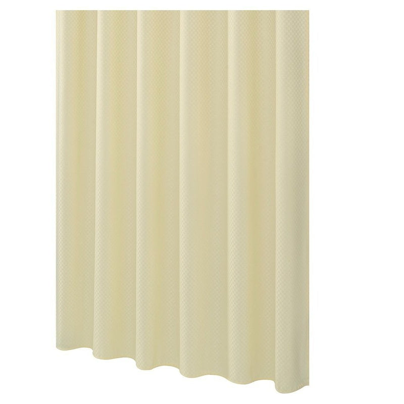 Close view of the waffle weave texture on cream fabric