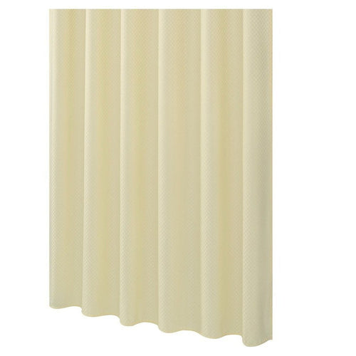 Close view of the waffle weave texture on cream fabric