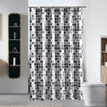 Even mosaic of black and grey squares repeating on a white ground
