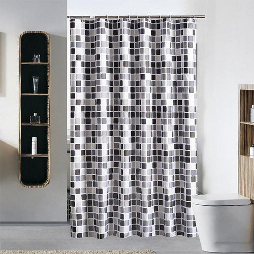 Even mosaic of black and grey squares repeating on a white ground