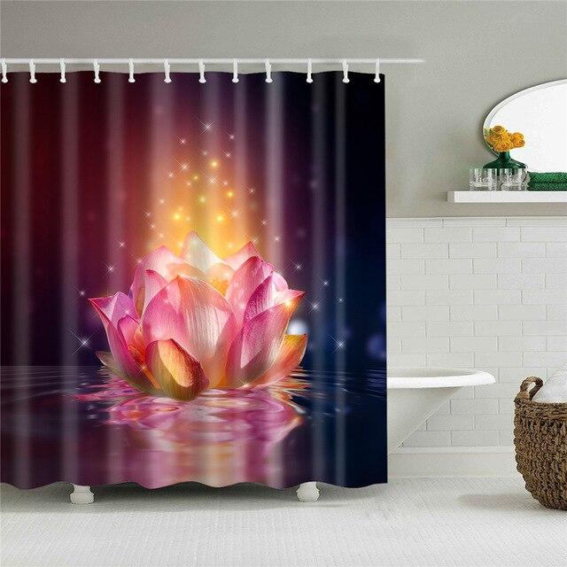 Large pink lotus floating on water with a glowing halo on a dark ground