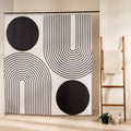 Two solid black discs and two blocks of concentric arcs on ecru