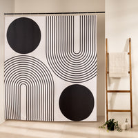 Two solid black discs and two blocks of concentric arcs on ecru