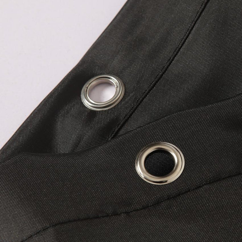 Upper hem of the black panel with reinforced eyelets for shower hooks