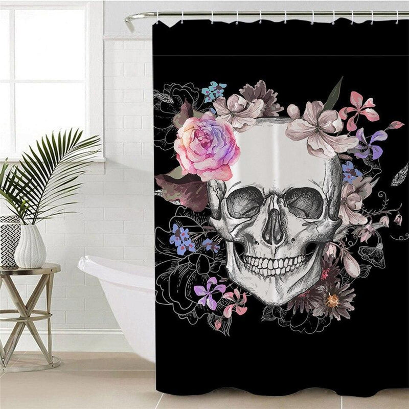 White skull ringed by drawn roses and pastel flowers on solid black