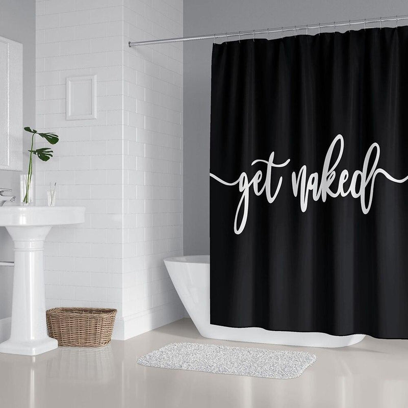 Matt black panel with the words get naked in white calligraphy at the centre