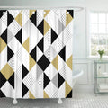 Matte black, white and mustard triangles paved evenly across the panel