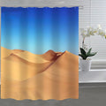 Clear sky blue upper half meeting golden brown sand dunes below