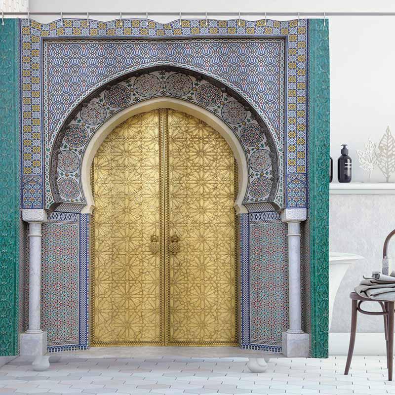 Carved golden Moroccan doors framed by blue and turquoise zellige tiles