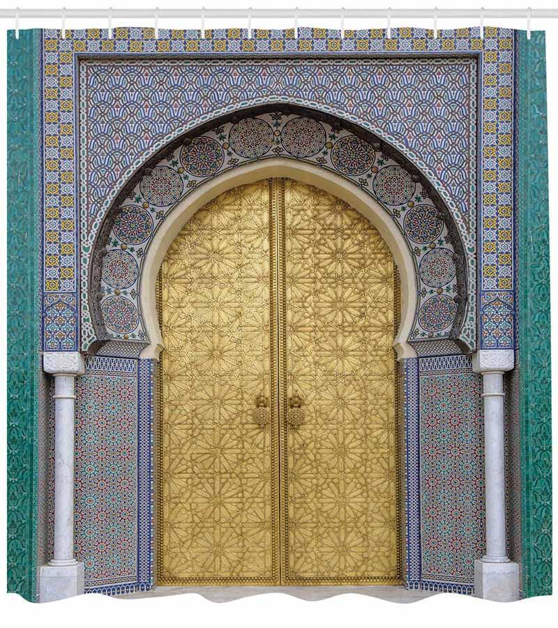 Close detail of the gold door carving against the blue tile surround