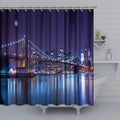 Brooklyn Bridge and city skyline glowing blue under a deep purple sky