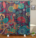 Turquoise pink and orange paisleys and rosettes covering a midnight blue ground