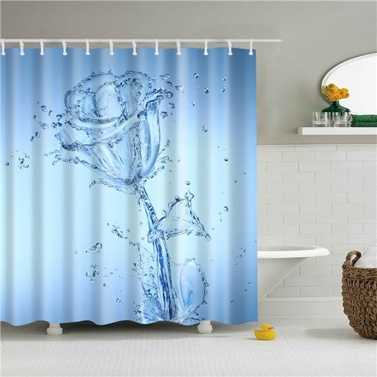 Rose sculpted from splashing water with suspended droplets on a light blue gradient