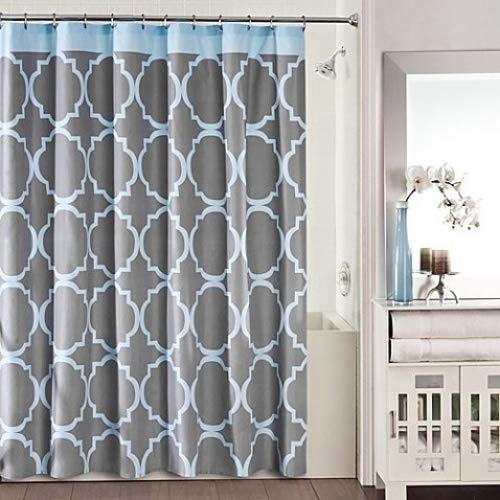 Light blue quatrefoil trellis on grey with a blue band across the top