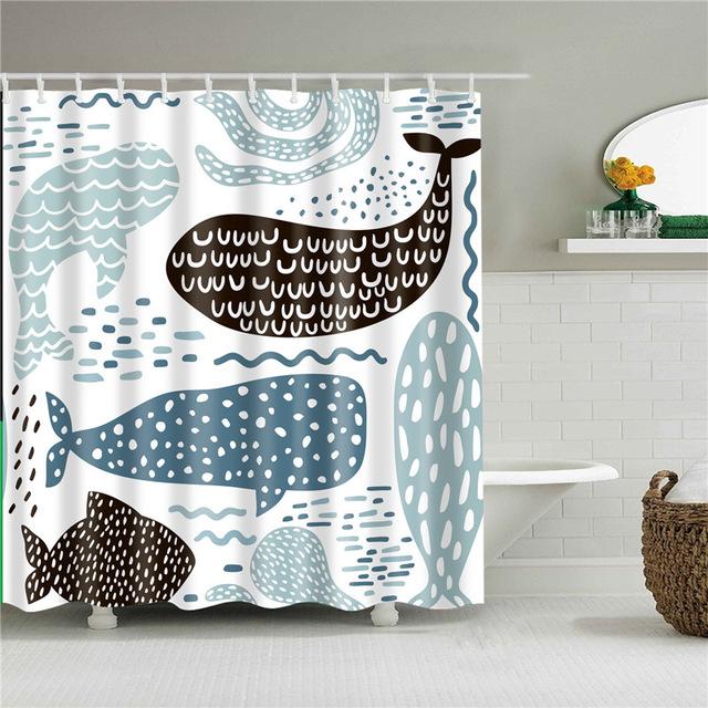 Drawn blue grey whales repeating with dots ripples and dashes on white
