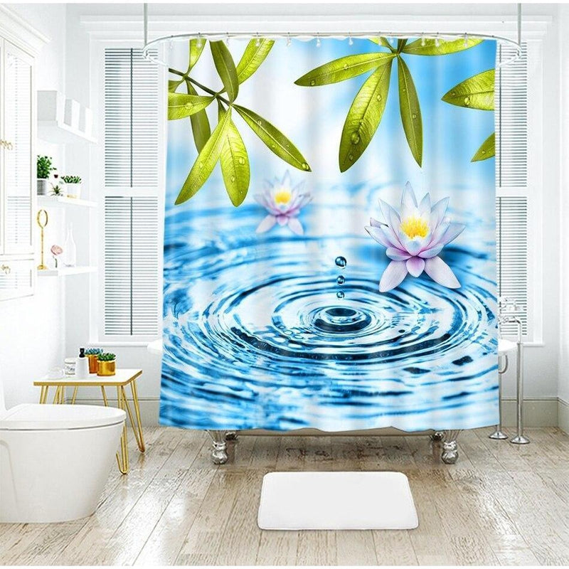 Azure water with concentric ripples from a fallen drop and a water lily