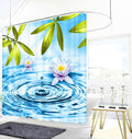 Green lily pads overhanging the rippled blue water on hanging fabric