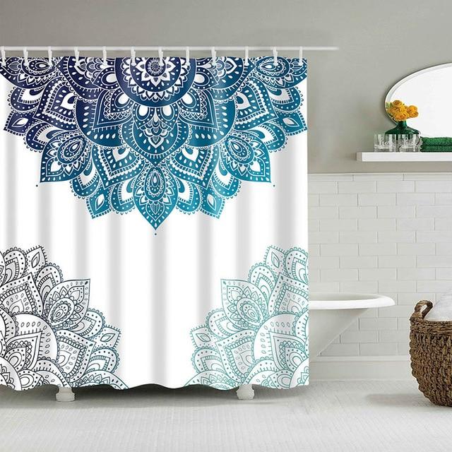 Navy and turquoise half mandalas framing a large pale grey mandala on white