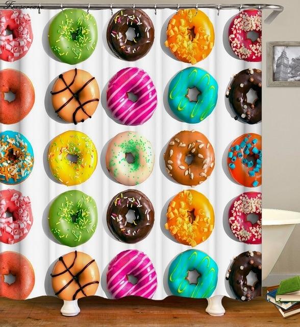 Grid of donuts iced in green neon pink turquoise and chocolate on white