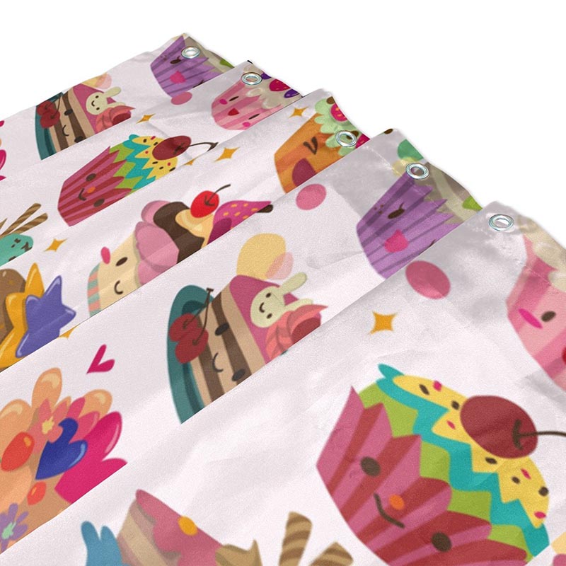 Close view of the cupcakes and candy dots on hanging fabric