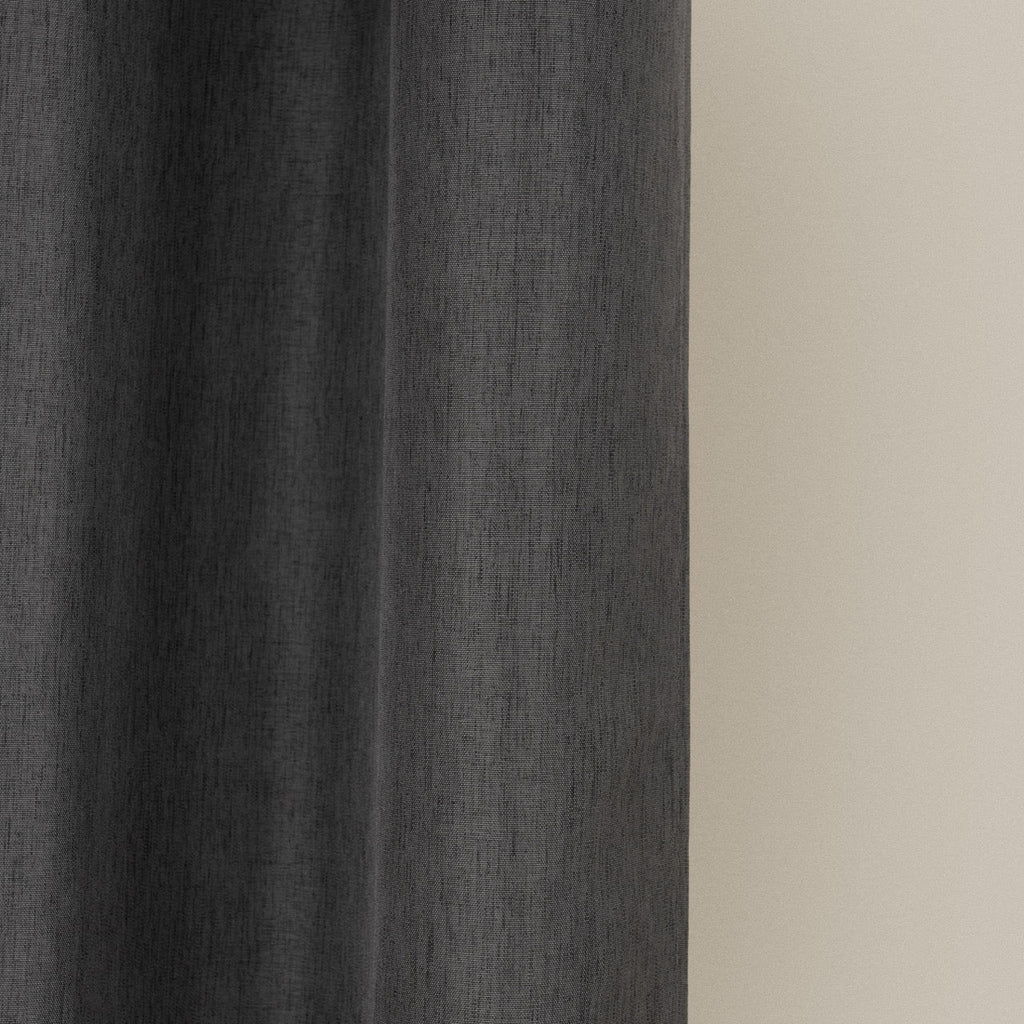 Weighted lower hem keeping the charcoal panel hanging evenly straight