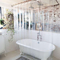 Fully transparent vinyl panel with a brick wall sharply visible through it