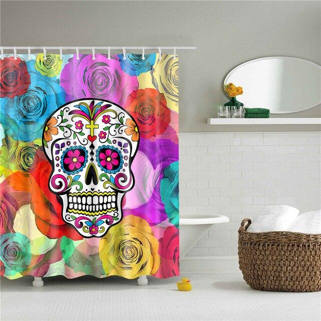White floral sugar skull over a watercolour carpet of pink blue and yellow roses