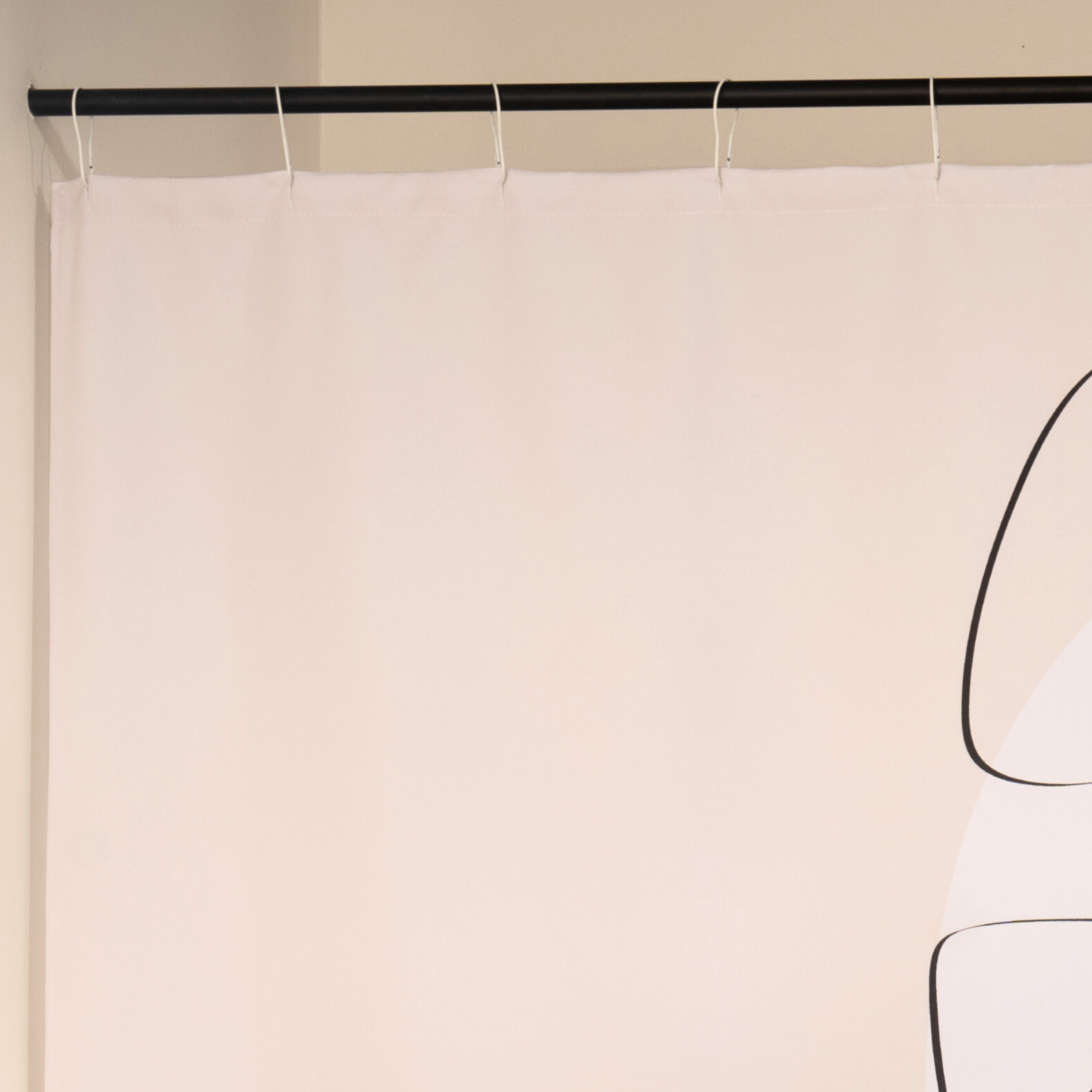 Close detail of the continuous line portrait on the cream weave