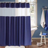 Wide white band across the top of a deep navy curtain panel