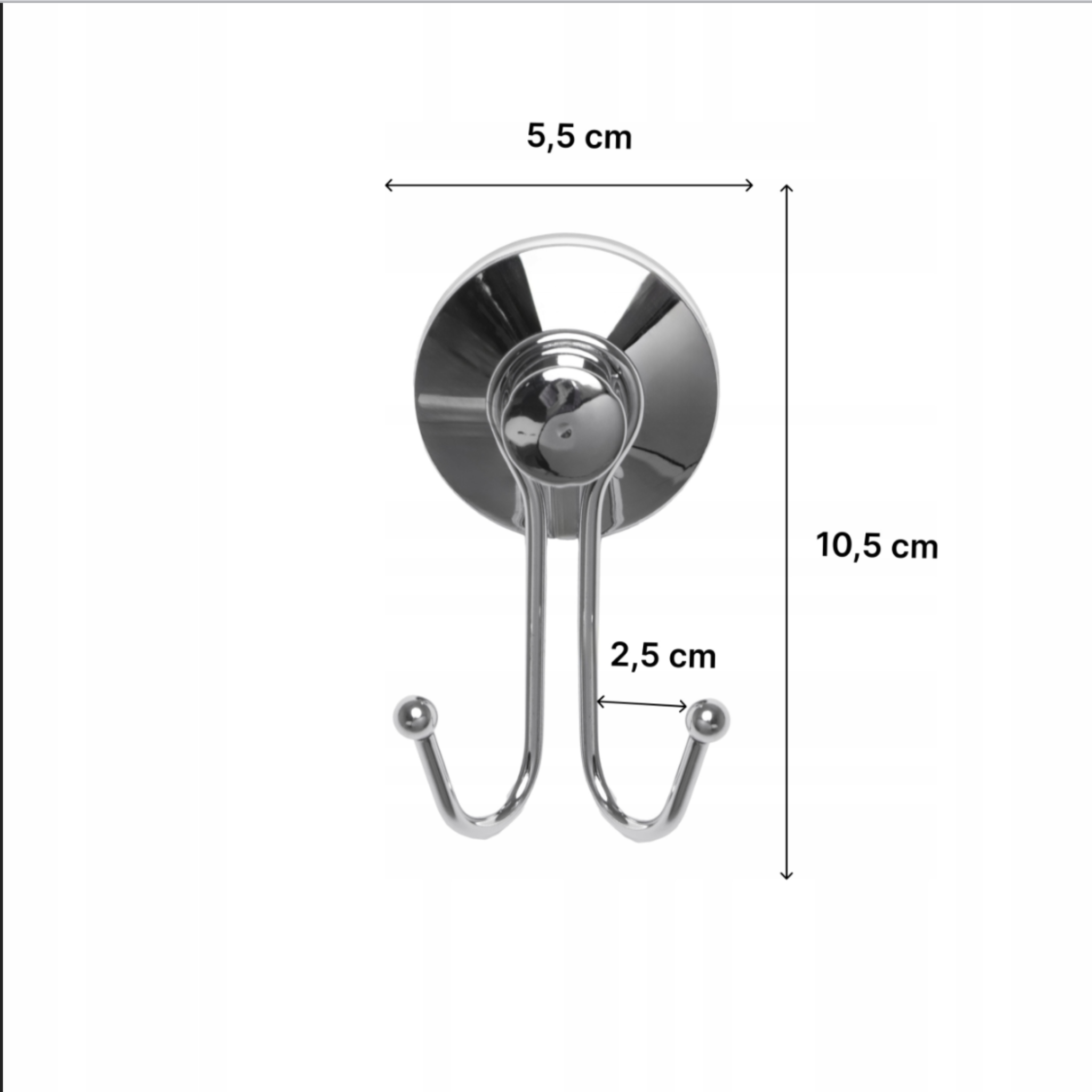 Silver double hook holding two towels on the bathroom wall