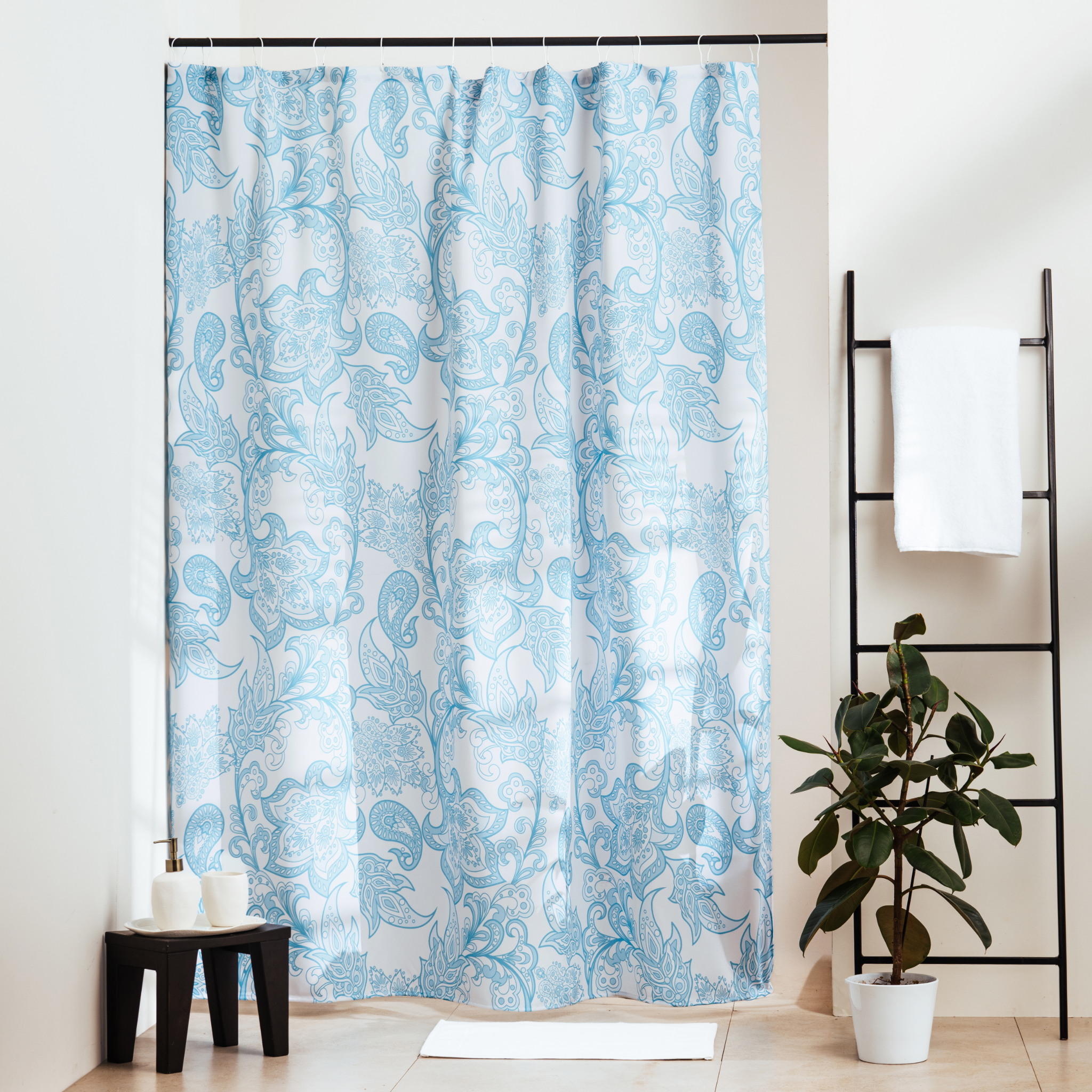 Softly faded grey-blue floral printed across an off-white ground