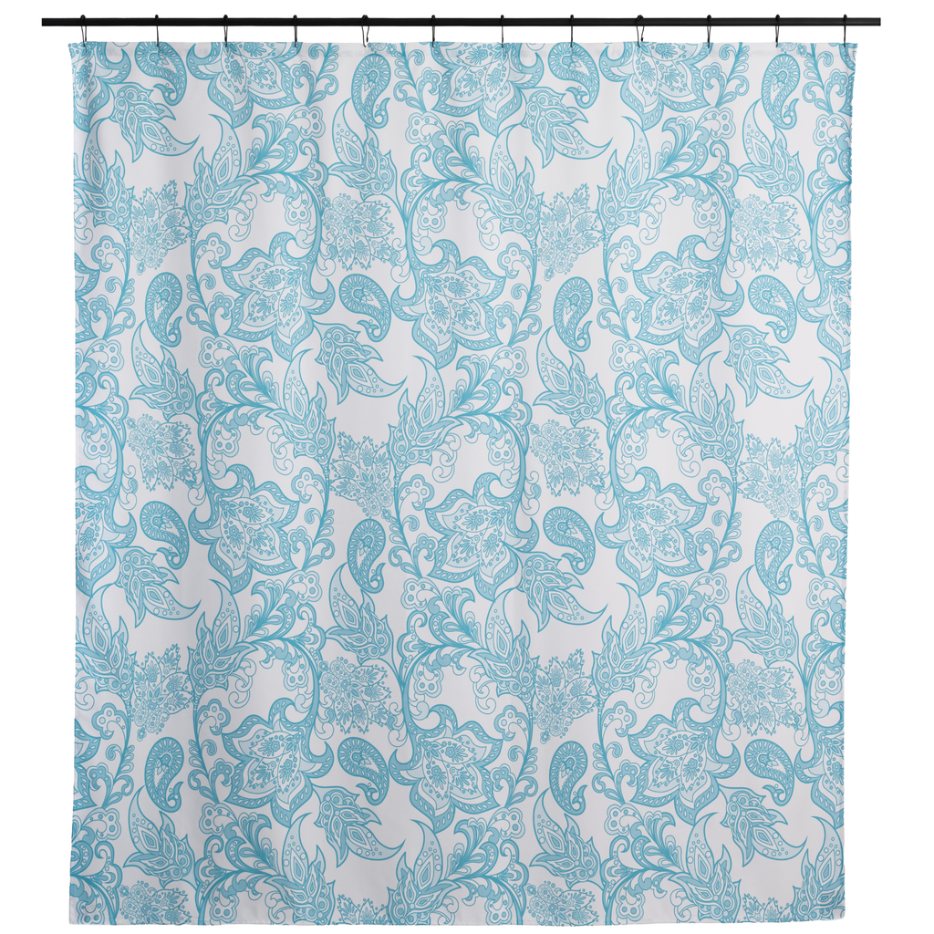Dusty blue floral curtain styled in a bright bathroom in daylight