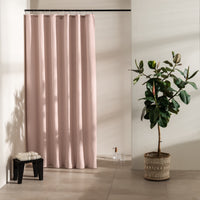 Muted powder pink panel with a fine waffle texture and no pattern