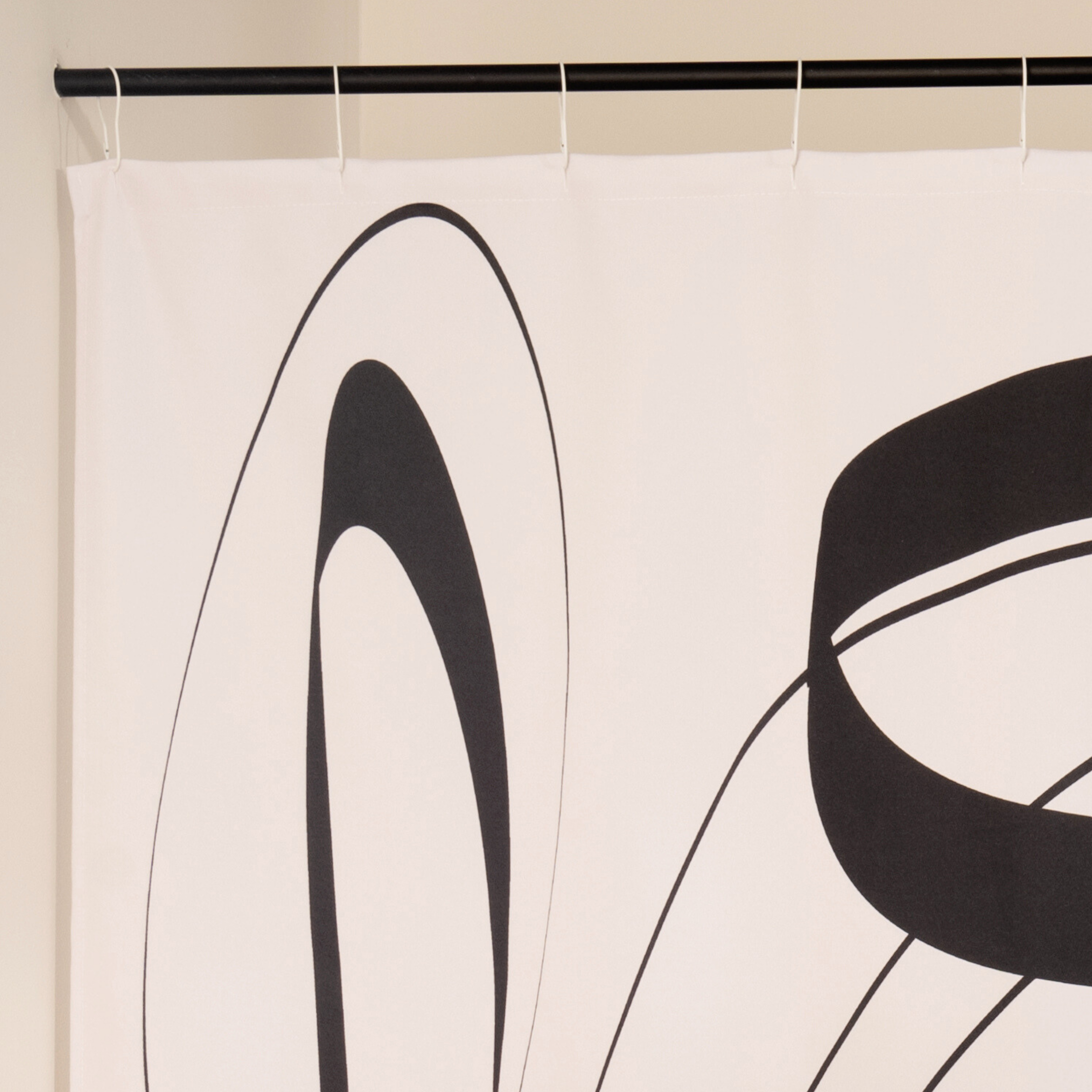 Close detail of the heavy ink stroke against the white weave