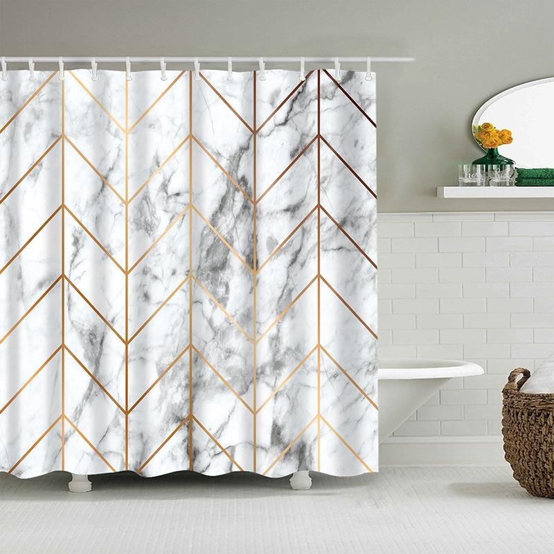 Fine gold chevrons overlaid on grey-veined white marble across the panel