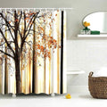 Autumn woodland with orange and ochre foliage on dark trunks in golden light