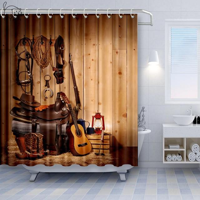 Pale pine plank wall hung with a lasso saddle boots lantern and guitar