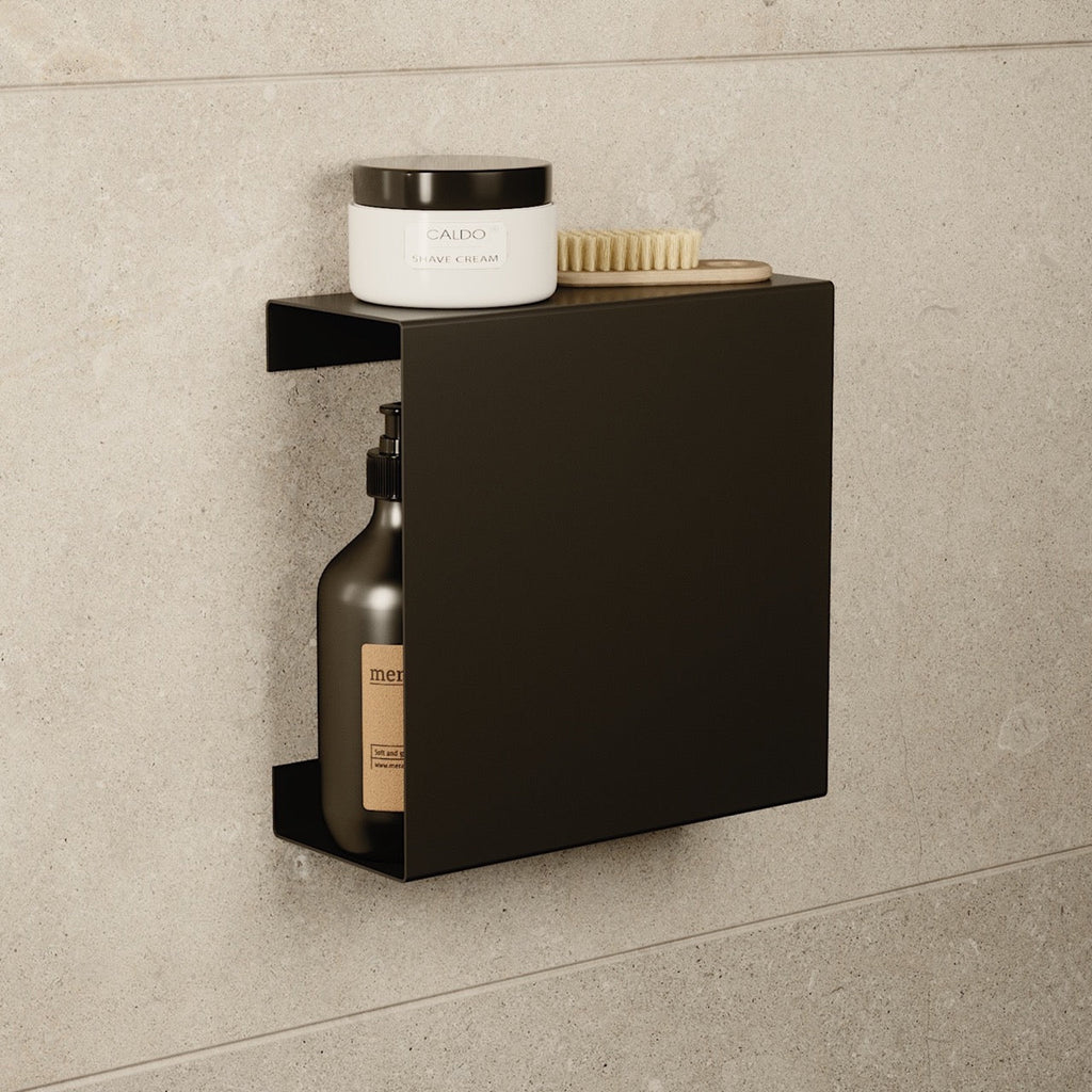 Black stainless floating shelf with a concealed mount hiding all fixings
