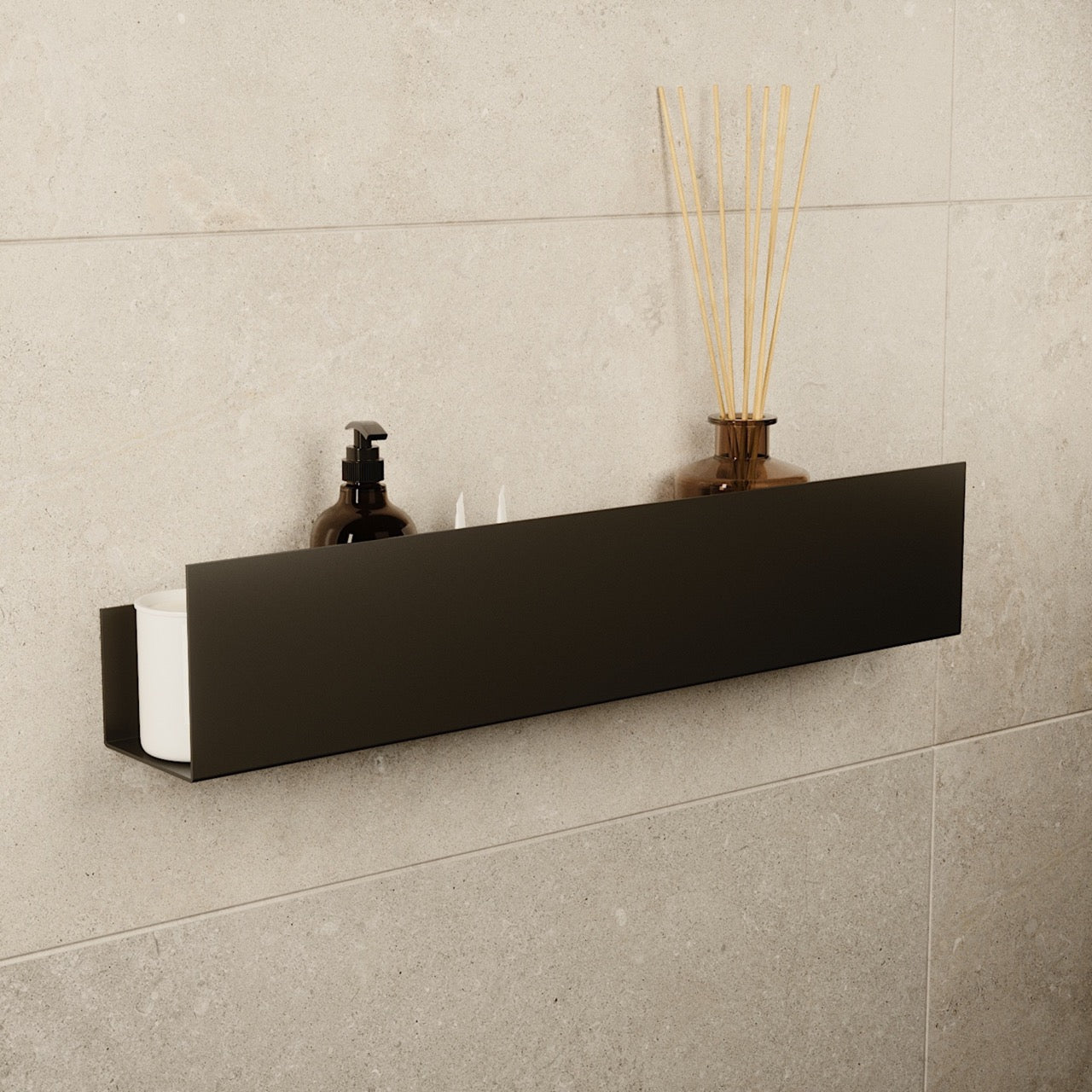 Large black stainless steel floating shelf mounted on a tiled wall
