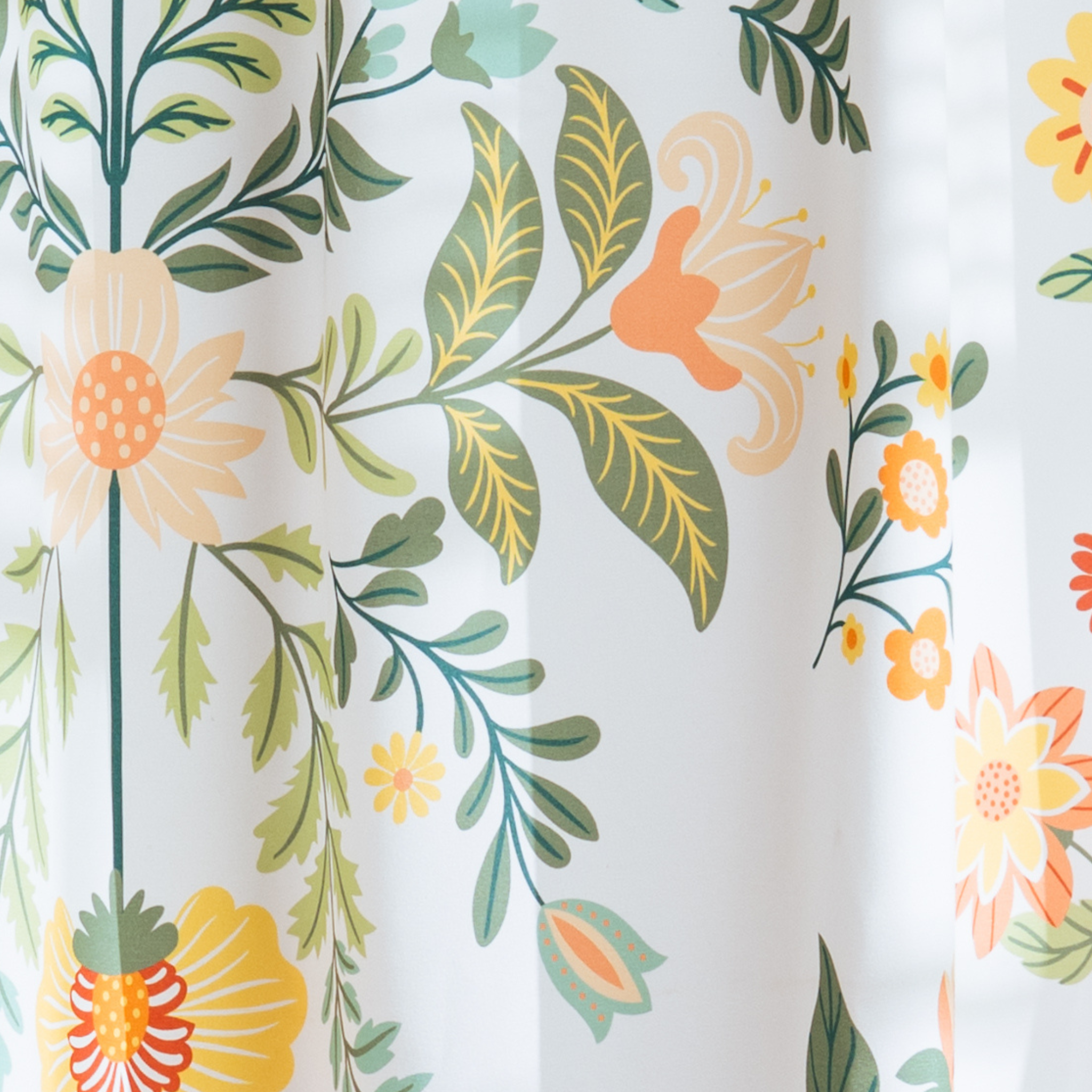 Upper hem of the floral panel with its reinforced hanging eyelets