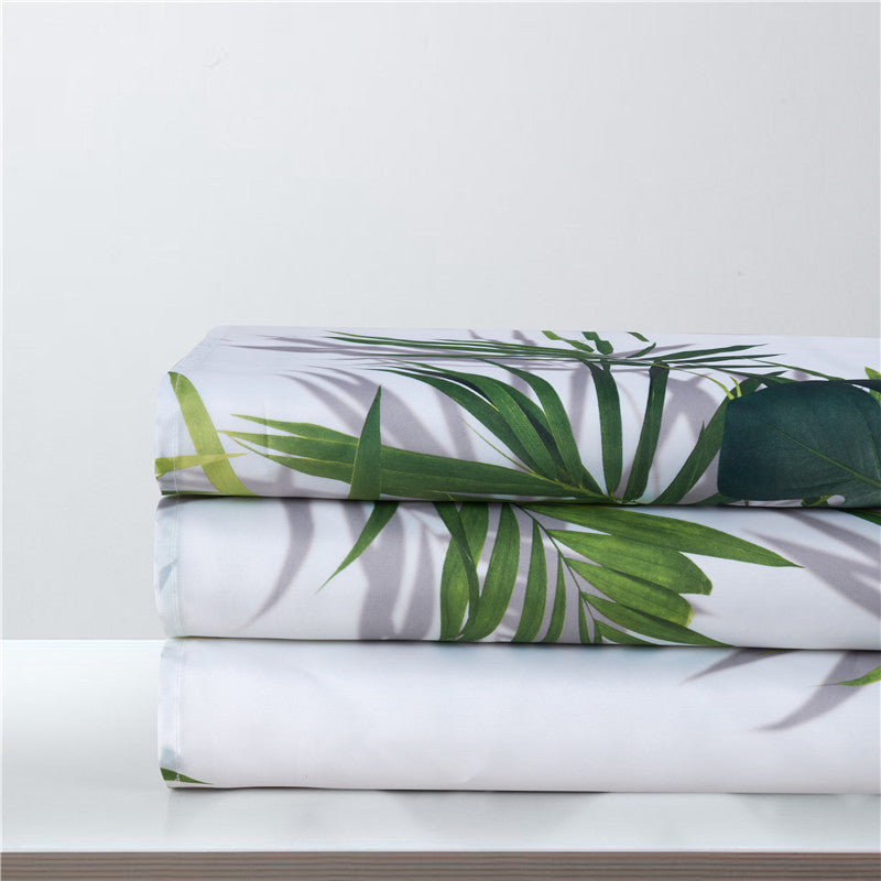 Full length white curtain hanging with its green leaf band on show