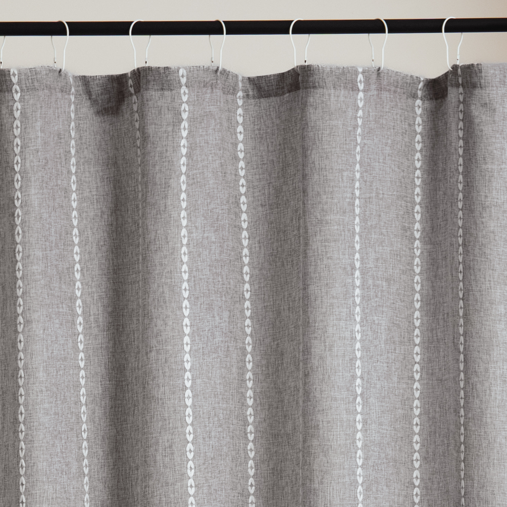 Close detail of the grey striae running through the woven cloth